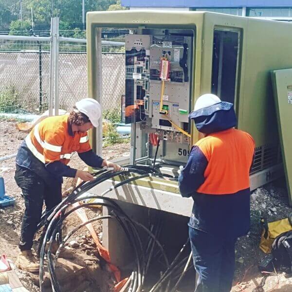 Dave Fenech Electrical Services Level 2 electrician in Blacktown completing power pole and switchboard upgrade connections.