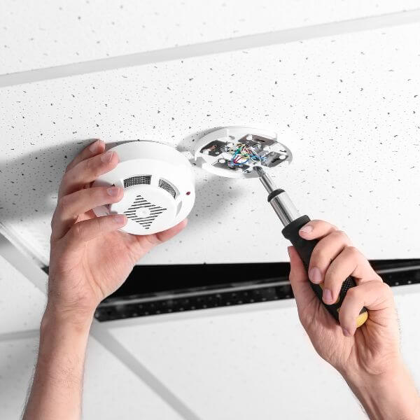 Dave Fenech Electrical Services electrician in Sydney installing and testing smoke alarms to ensure fire safety and NSW compliance.