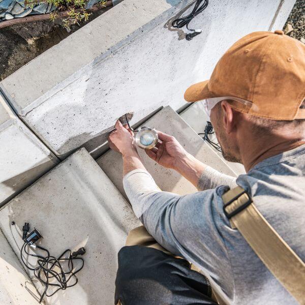 Dave Fenech Electrical Services electrician in Sydney installing outdoor lighting to improve safety and enhance property appearance.