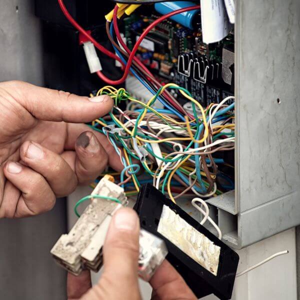 Dave Fenech Electrical Services electrician in Sydney performing electrical fault finding and repairs on damaged household wiring.