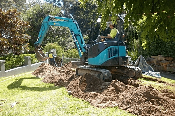 Underground electrical contractors in Sydney using excavation equipment for residential power cabling by Dave Fenech Electrical Services Underground electrical contractors in Sydney using excavation equipment for residential power cabling by Dave Fenech Electrical Services
